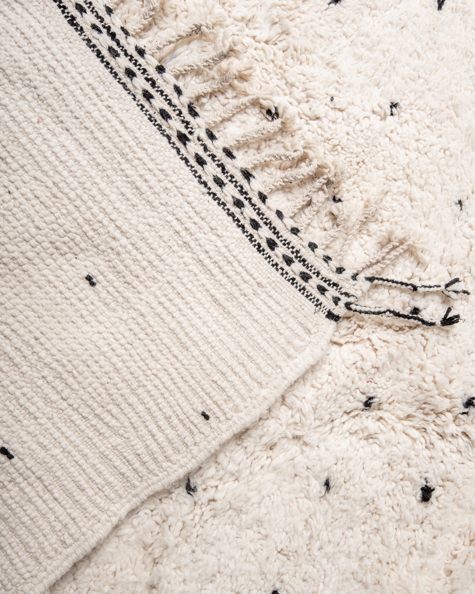 Modern, designer, handcrafted Berber rug from Morocco. Beniourain carpet with beautiful colours and patterns and fluffy wool texture.